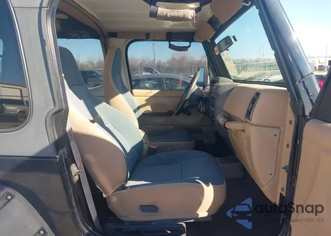 2002 Jeep Wrangler Sahara z USA, uszkodzony, nr VIN 1J4FA59S12P701045